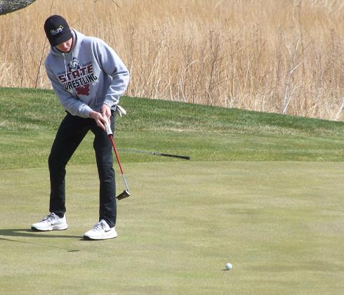 Tate Wood looks to sink a long putt. Photos provided