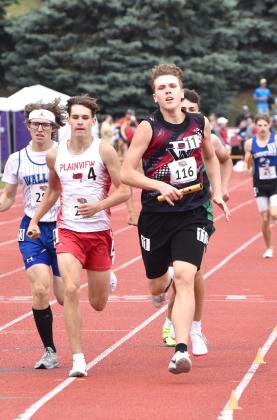Everett Gleason (above) and Landon Bittner ran the final two legs of the 4x800-meter relay. NCJ photos by Beth Sparrow