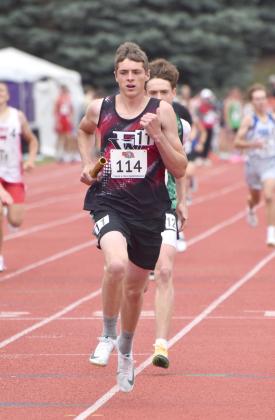 Everett Gleason and Landon Bittner (above) ran the final two legs of the 4x800-meter relay. NCJ photos by Beth Sparrow