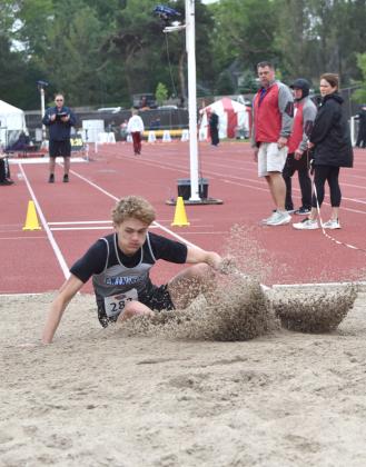 Twin River’s Caleb Rood competed on Friday in the triple jump. He finished 21st over all with a jump of 39-07.00. NCJ photo by Beth Sparrow