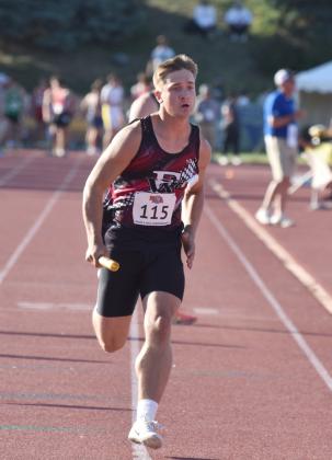 Cael Dubas runs his leg of Fullerton’s 4x400-meter relay. NCJ photo by Beth Sparrow