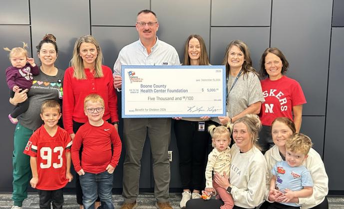 Representatives from Boone County Health Center’s Occupational, Speech, Physical Therapy and Grant/PR departments along with several children who have benefited from Pediatric Therapy accept a $5,000 Valero Benefit for Children grant from Valero representatives Andy Roberts, Plant Manager, and Nicole Levander, Office Coordinator. Photo provided