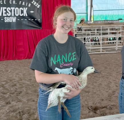 Fullerton grad Elena Reimer has worked as an extension intern this summer. Last week she saw the other side of the Nance County Fair. NCJ photos by Rick Holtz