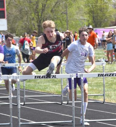 LEFT: Kaycee Harter finished 33rd overall in the shot put with a 22-02 throw. RIGHT: Kyle Horn won the 300-meter hurdles with a time of 44.47 and finished second in the 110-meter hurdles with a time of 16.83. NCJ photo by Beth Sparrow