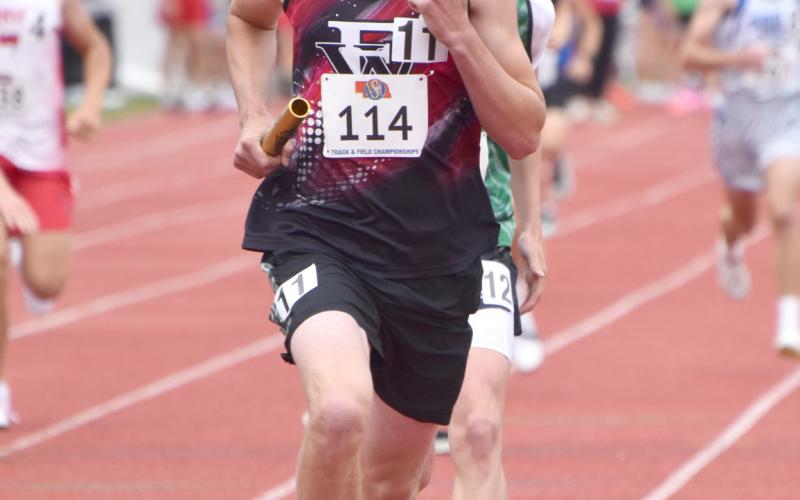 Everett Gleason (left) and Landon Bittner ran the final two legs of the 4x800-meter relay. NCJ photos by Beth Sparrow