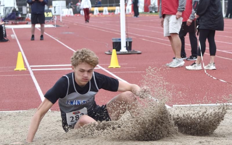 Twin River’s Caleb Rood competed on Friday in the triple jump. He finished 21st over all with a jump of 39-07.00. NCJ photo by Beth Sparrow
