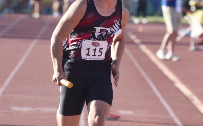 Cael Dubas runs his leg of Fullerton’s 4x400-meter relay. NCJ photo by Beth Sparrow