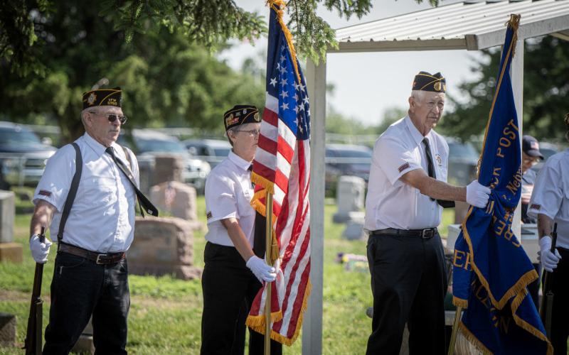 Jon Epley, Kathy Koziol and Dennis McCoy take part in the annual service.