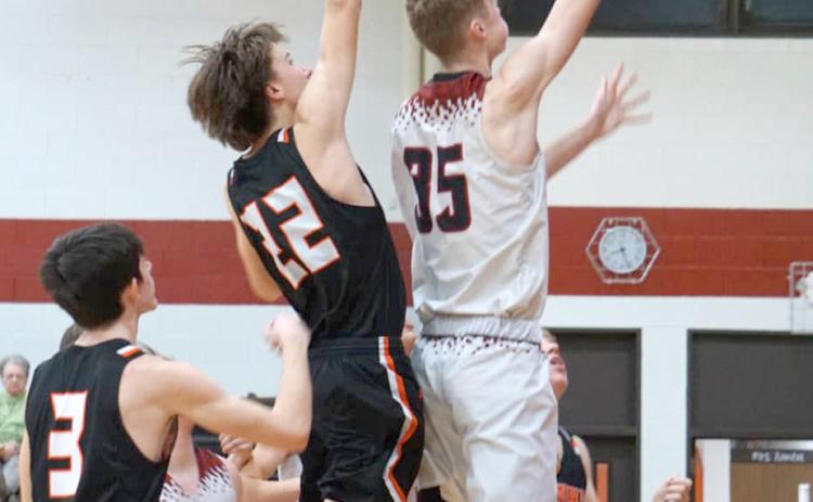 Kane Wetovick scores 2 of his game-high 17 points on Monday. NCJ photo by Cathy Cook