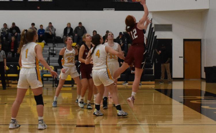 Pictured above: Julianna Maxfield going up for a lay-up in the Holiday tournaments last week. Picture by Beth Sparrow