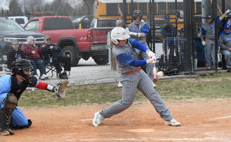 Paydon Rinkol connects on his first of two doubles on Thursday. The junior also pitched 4 strong innings for the Titans, giving up just 3 runs on 3 hits.