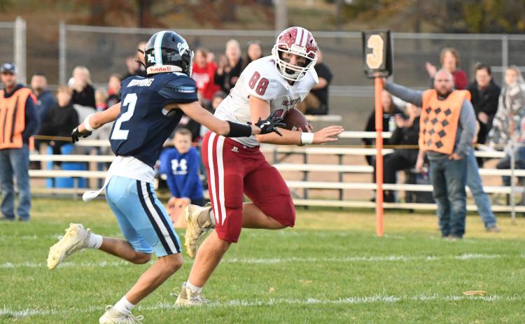 Hunter Gochenour races to the endzone for his first of two touchdown receptions. The senior caught seven passes for 66 yards. NCJ photo by Rick Holtz
