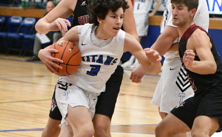 Corbin Rodriguez finds a path down the lane on his way to two points on Friday against Fullerton. NCJ photo by Rick Holtz
