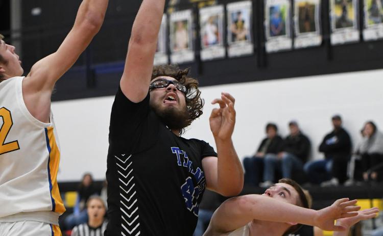 Ryder Kleckner goes up strong for two of his 6 points on Saturday against Shelby-Rising City. NCJ photo by Rick Holtz