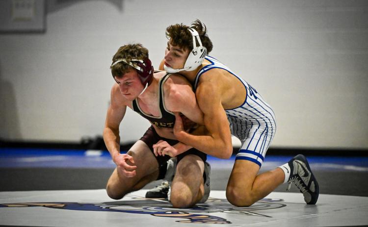 Braxtin Fowler pinned East Butler’s Tristan Kocin in 2:58 last week at the Twin River Quad. NCJ photo by Jen Johnson