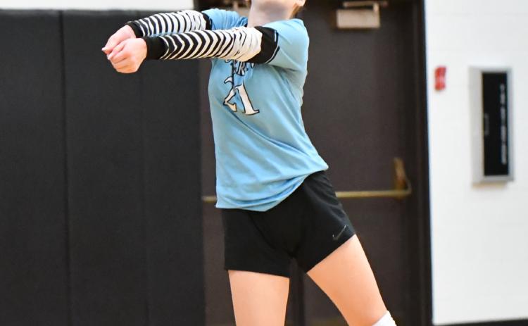 Korie Konwinski makes a play in the back row for Fullerton in the season-opener against Cross County. NCJ photo by Rick Holtz