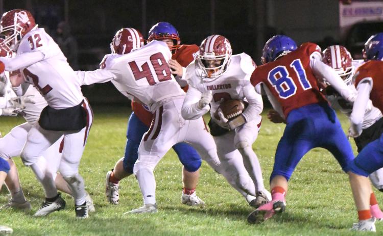 Aiden Norman finds the holes made by his offensive line on his way to running for 82 yards on 21 carries. NCJ photos by Rick Holtz