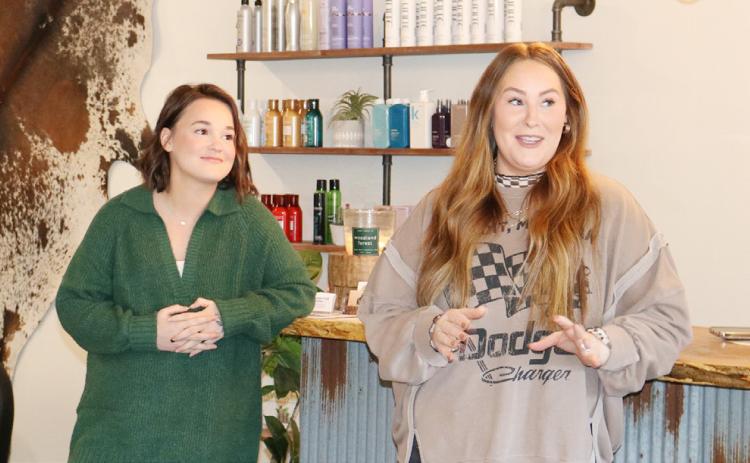 Stylist Zoe Wetovick (left), and owner Autumn Schmale tells guests how their business got started. Photos provided