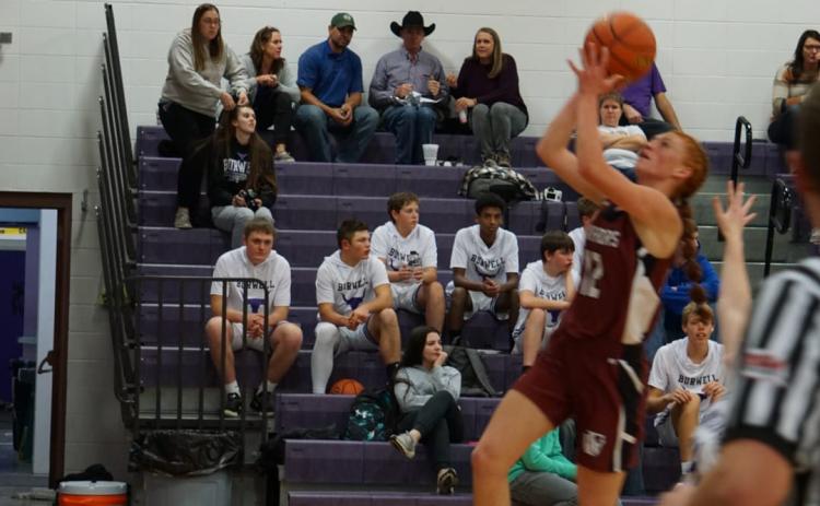 Senior Julia Maxfield goes in for an easy layup. Photo by Laura Sabata