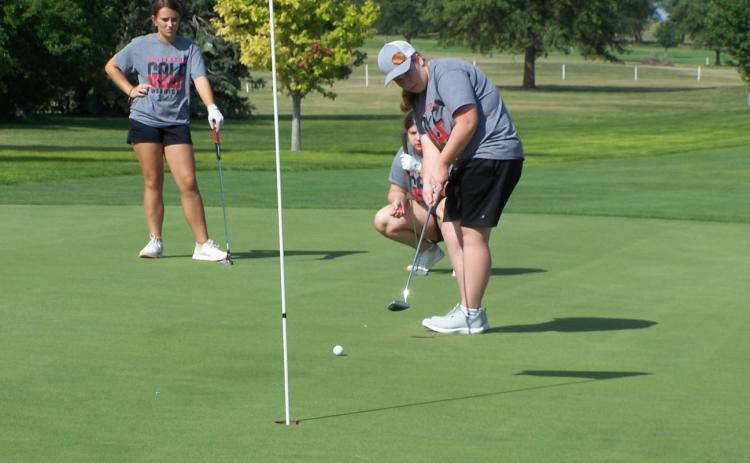 Tierney Russell puts for par on hole No. 5. Photo provided