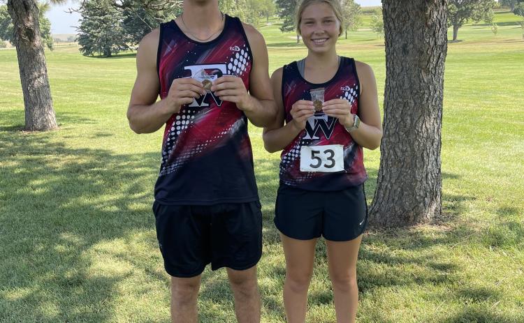 Fullerton's Justin Horn (left) and Morgan Supik earned medals at the Boone Central Invitational.