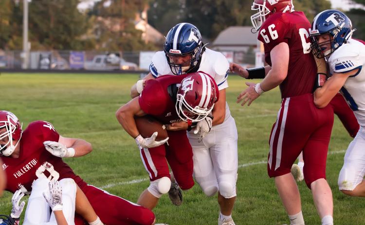 Aiden Norman carried the ball 25 times for 141 yards on Friday, getting into the end zone three times on the ground and catching a fourth touchdown. NCJ photos by Whitney Busch