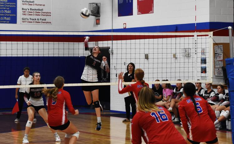 Josie Williams goes on the attack for the Warriors against High Plains last week. Photos by Laura Sabata