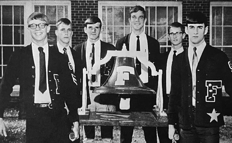 F Club officers Bill McKeeman (left), Sam Brower, Bill Morgan, Doug Smoyer, Jim Maly and Greg Zabka carry the Victory Bell in the bell’s early days. Photo provided
