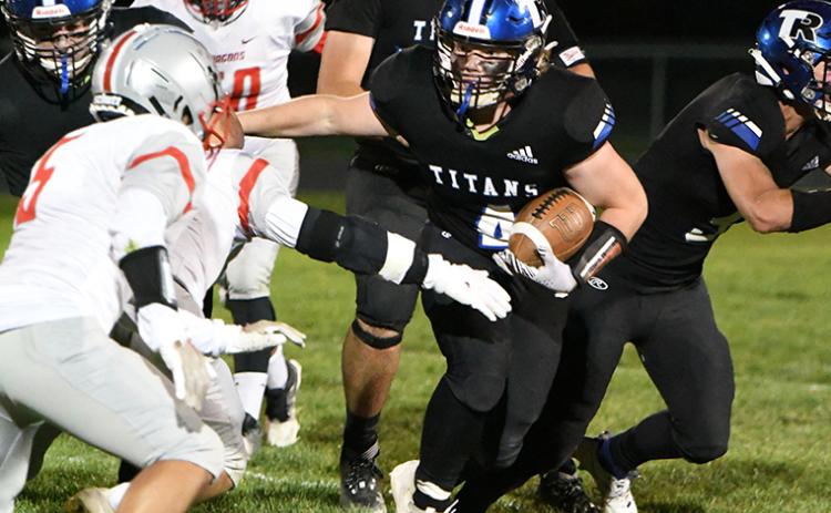 Paydon Rinkol set multiple Titan rushing records on Friday in Twin Rivers 67-26 win over Madison. NCJ photo by Rick Holtz