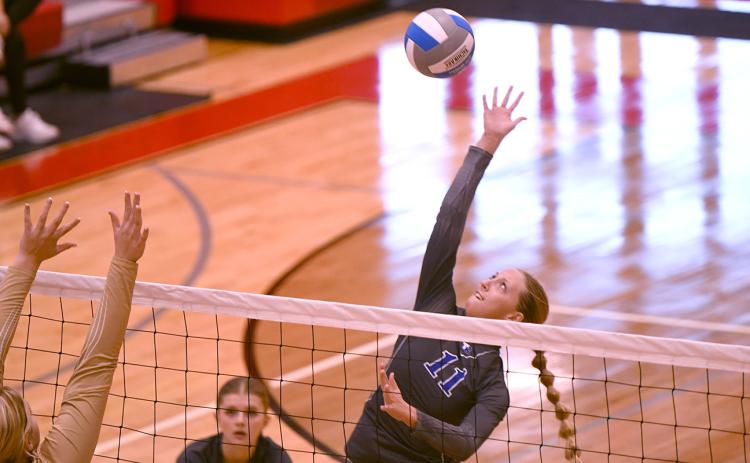 Tricia Kunkee finished with 10 kills against Madison. NCJ photo by Rick Holtz