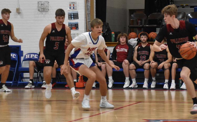 Kane Wetovick looks for a path to the basket against High Plains. NCJ photo by Beth Sparrow