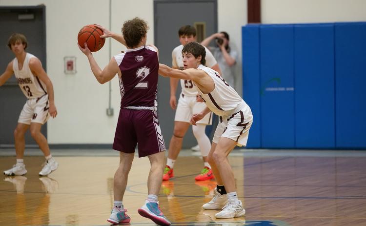 Nolan Dubas played tight defense on Monday against Neligh-Oakdale. NCJ photo by Whitney Busch
