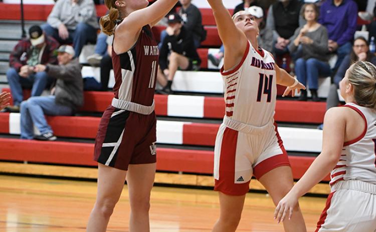Jaci Maxfield scores two of her game-high 15 points on Saturday. NCJ photos by Rick Holtz