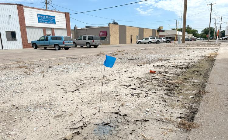 Blue flags are popping up around Fullerton. Crews are marking water shutoffs. NCJ photo by Rick Holtz