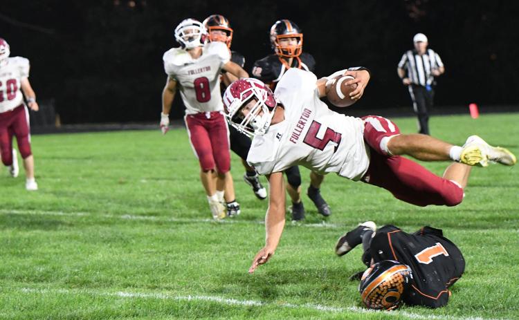 Fullerton senior Fletcher Dubas put his body on the line on Friday against Osceola. He finished with 286 rushing yards and 4 touchdowns. NCJ photo by Calvin Holtz