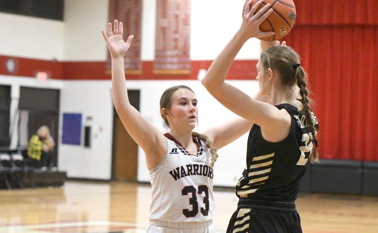 Keila Dubas and Fullerton's defense held Ansley/Litchfield scoreless for nearly 12 minutes on Tuesday. The Warriors capitalized on the scoring drought, rallying to take the lead in the second half. NCJ photo by Rick Holtz