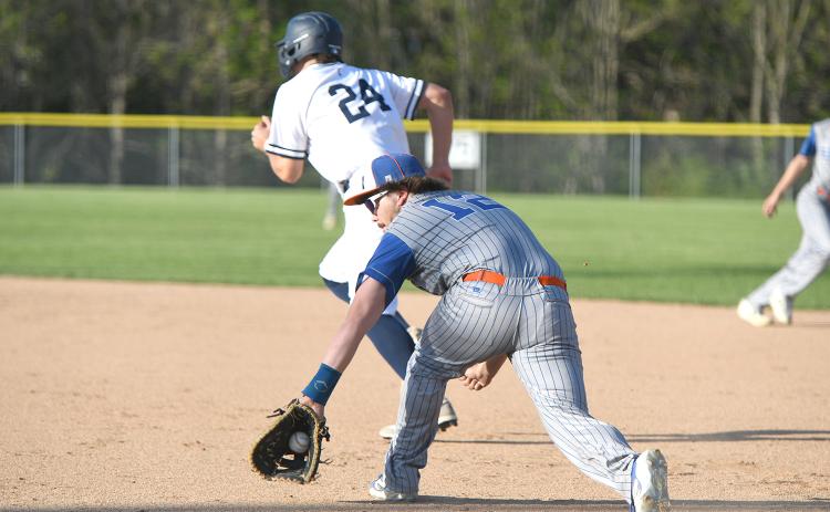 Garrett Alexander makes the play at first base during second inning. NCJ photos by Rick Holtz