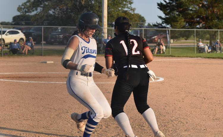 Adalyn Bishop reaches first base against the Polk County Slammers last week. NCJ photo by Beth Sparrow