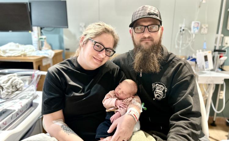 Brent and Amanda Voichahoske with new baby Eleanor Rose. Photo provided