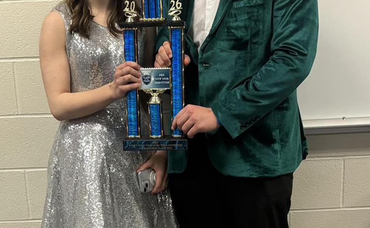 8th and Broadway dance captains Tori Decker and Terrick Gonsior accept the show choir’s second place trophy. Photo provided