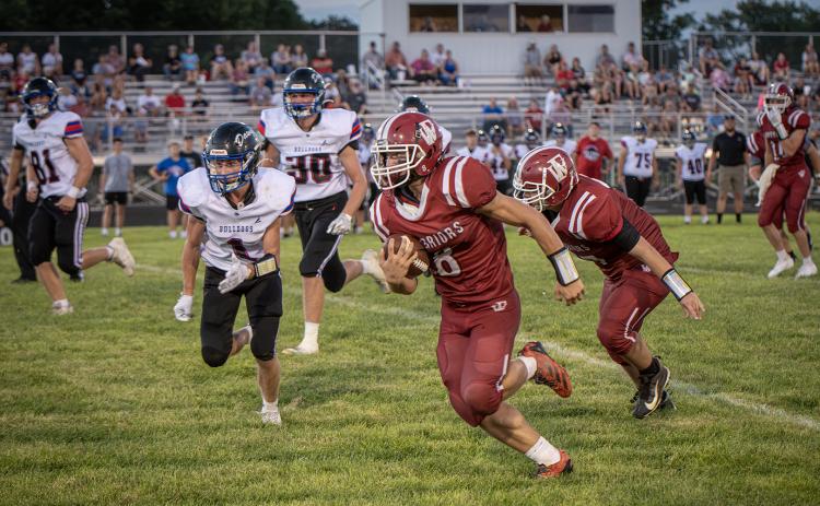 Cael Dubas carried the ball 15 times for 123 yards and three touchdowns. NCJ photos by Rick Holtz