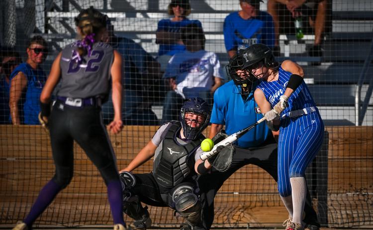 Adalyn Bishop cleared the bases with one swing of the bat. She launched a grand slam against Highway 91. NCJ photo by Jen Johnson