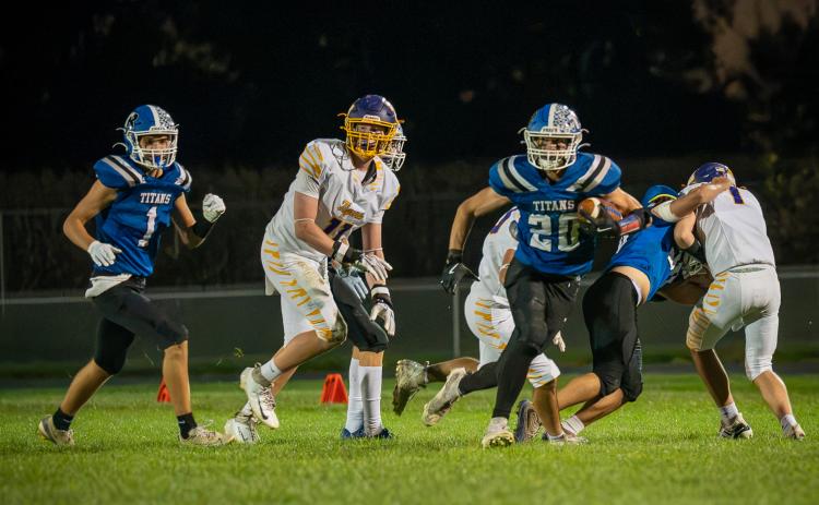 Cinch Beck carried the ball on his way to a team-high 90 rushing yards on Friday. NCJ photo by Jen Johnson