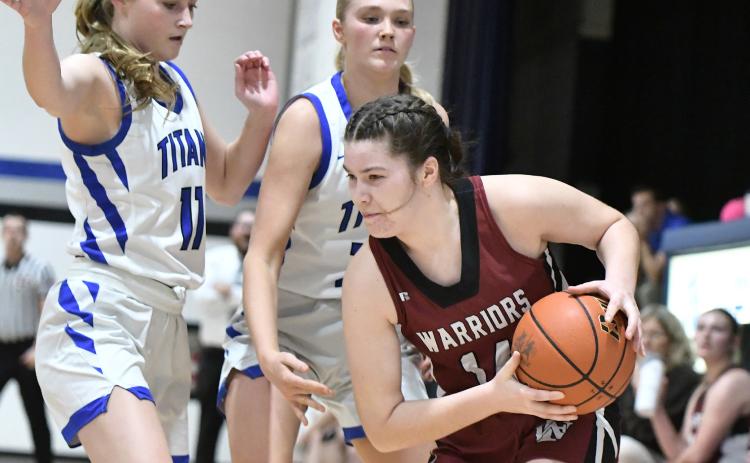 Twin River’s Katie Preister (left) and Grace Yrkoski pressure Fullerton’s Georgia Bridger during the first half of the Nance County Showdown. NCJ photo by Rick Holtz