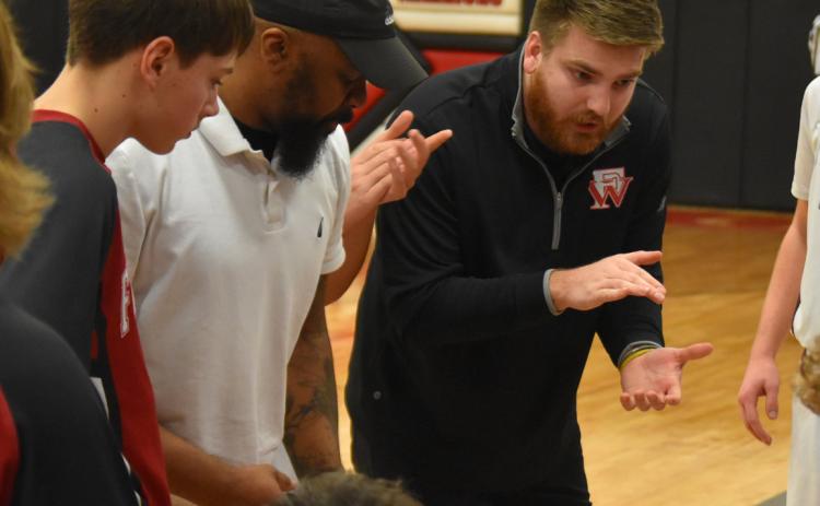 Assistant Coach, Will Wagner encourages the boys near the end of the 4th quarter against the close game against Lutheran High Northeast. Mr. Wagner is in his first year as a Para-Professional at FPS. He graduated from Central City in 2017.