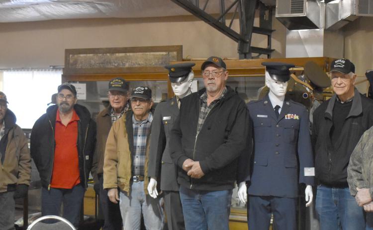 Local Veterans met with Judy Simonson and Judy Frey as the need for warmer uniforms arises. Pictured (from left to right) Chuck Delancey, Tom Rice, Henry Biggie, Dennis Gabriel, Mike Frey, Dennis McCoig, and Jon Epley.