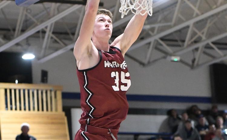 Fullerton’s Kane Wetovick throws down 2 of his career high 46 points on Thursday against Twin River. NCJ photo by Rick Holtz