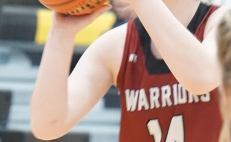 Pictured above: Georgia Bridger with full concentration shooting a free throw. Picture by Cathy Cook