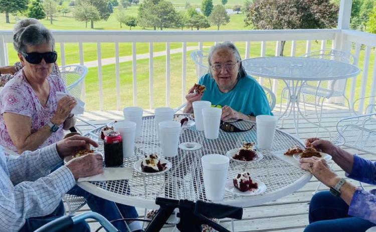Bernita Nathan and Ingrid Boardman enjoy time on the patio. Photos Provided