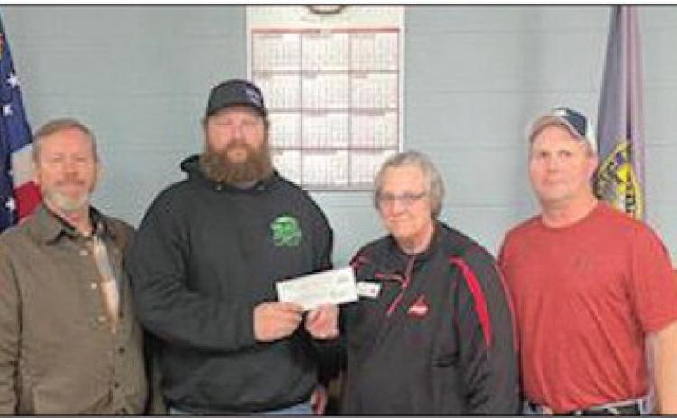 Pictured above from Left to Right: Dan Cornwell (NCDA Director), Seth Nelson (owner Cedar River Auto Sales and Service), MaryJoe Miller (NCDA Chairperson), and Tim Cornwell (Nance County Board of Supervisor Chairperson).